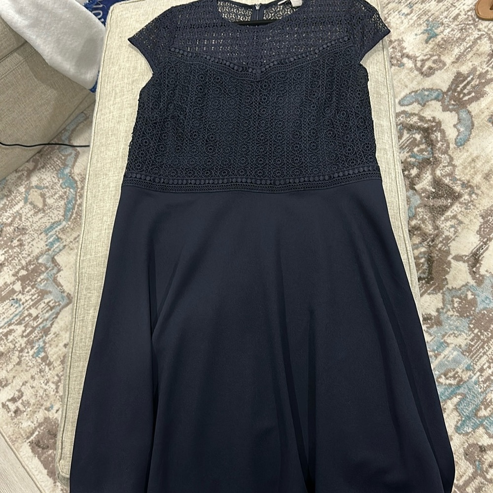 Navy fit and flare knee length dress with embroidered top